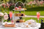 the-goring-hotel-london-celebrating-National-Afternoon-Tea-week-on-our-terrace-with-some-tasty-treats-and-a-glass-of-Bollinger